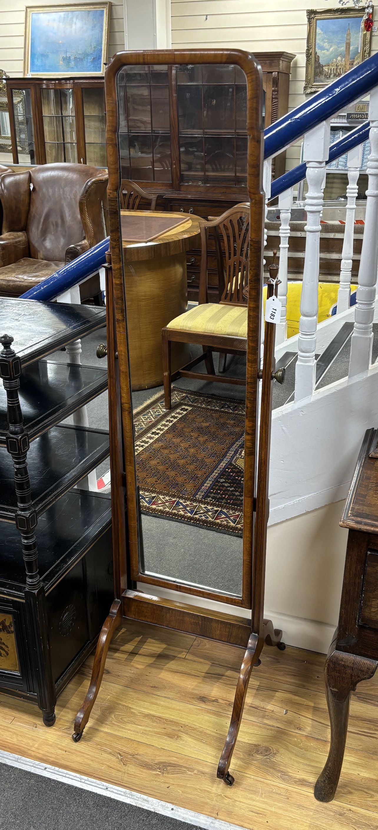 A Queen Anne Revival walnut cheval mirror, height 156cm